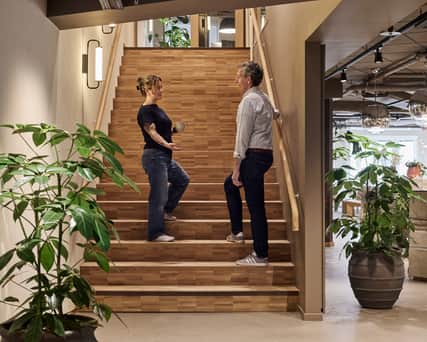 Person walking up stairs.